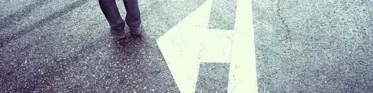 directional arrows painted on the road